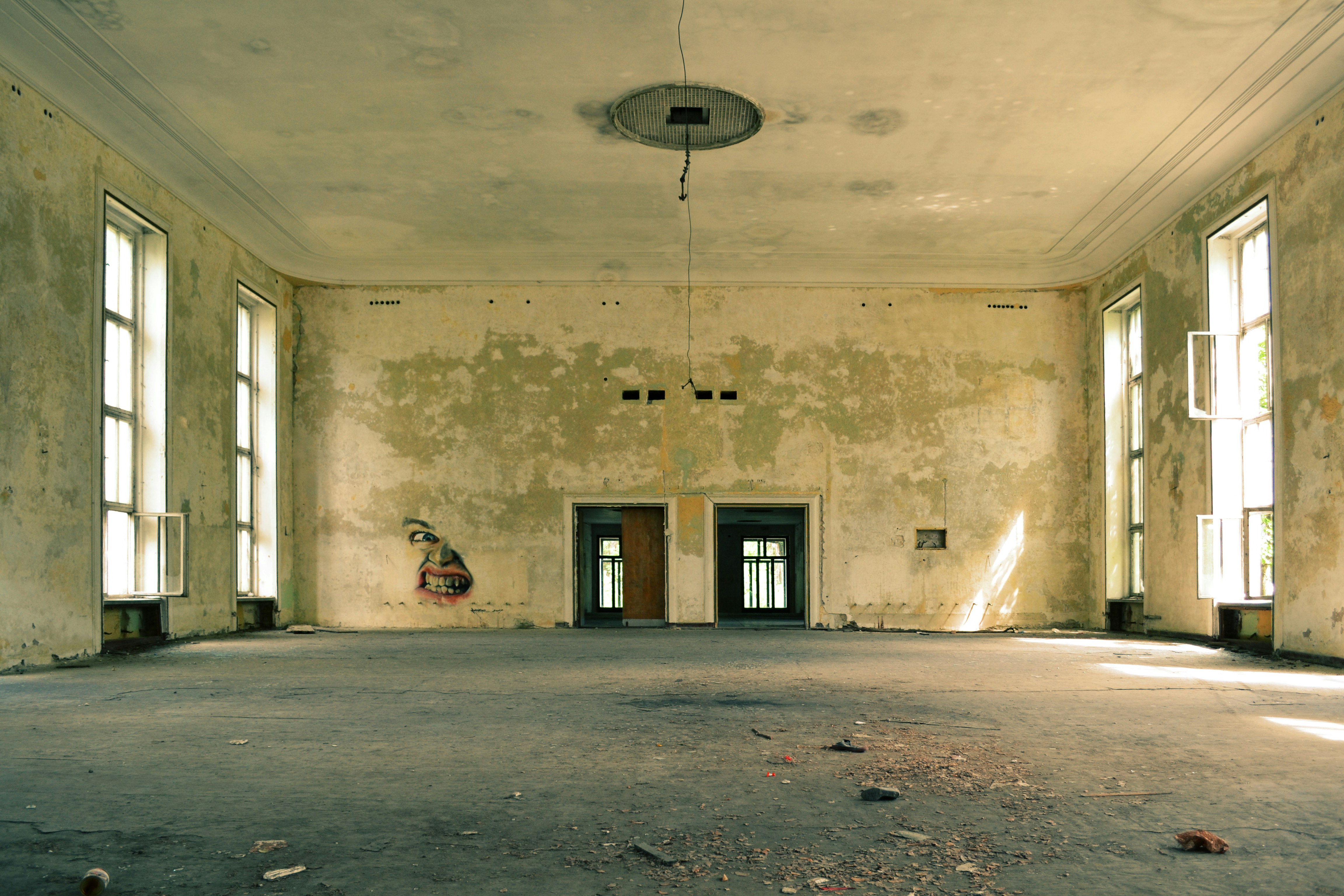 A creepy room inside an old abandoned building.